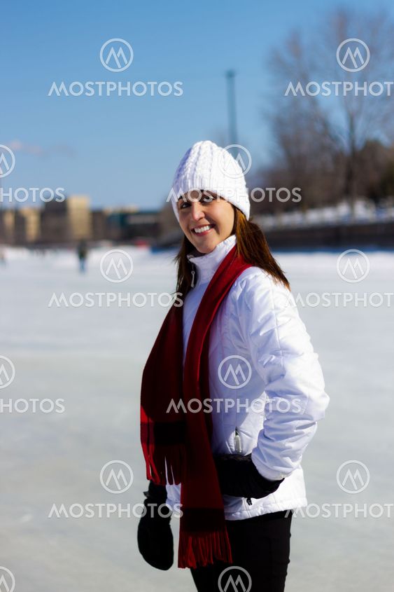 Portrait of a young woman on a skating rink