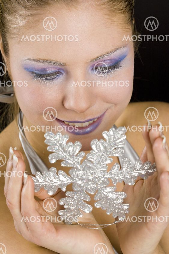 portrait of woman with snowflake