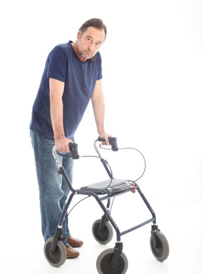 Man walking with a medical walker