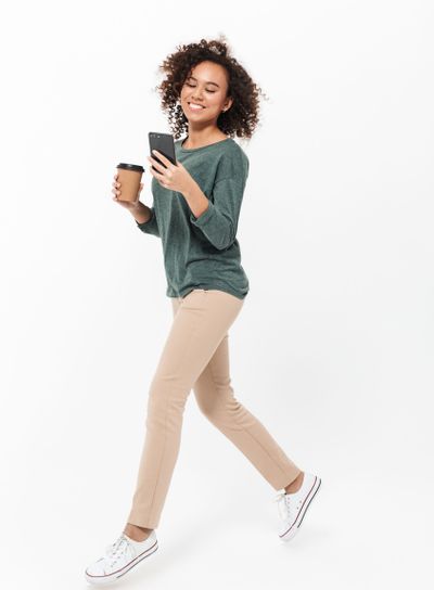 Full length of a happy young african woman