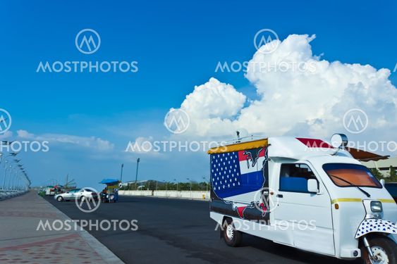 Tuk Tuk on the Beach with Blue Sky and cloud