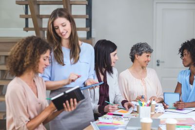Group of interior designers interacting with each other