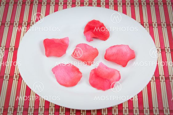 Set of rose petals on a plate.