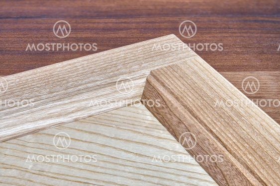 Stylish detail of furniture facade of veneer and solid ash