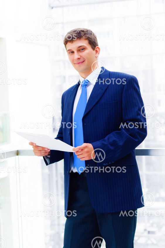 Smiling middle aged business man