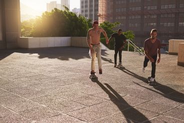 Training, friends and group with skateboard, sports and...