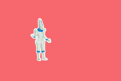 Miniature people toy figure photography. Side view full...