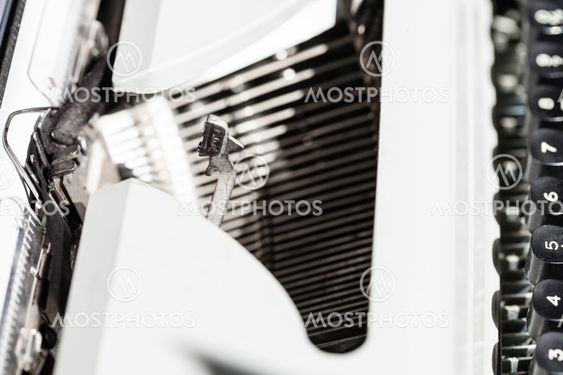 typebar operates in mechanical typewriter