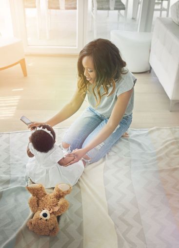 Happy woman, baby and cellphone for childhood...