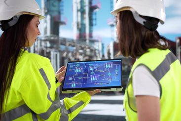 young female engineer inspects oil and gas plant