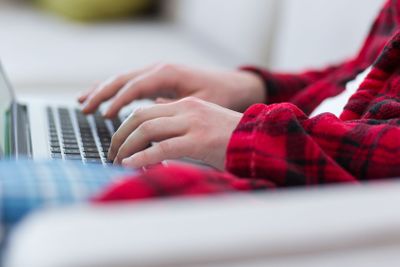 man freelancer in bathrobe working from home