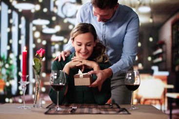 Romantic Couple Sitting Having Dinner