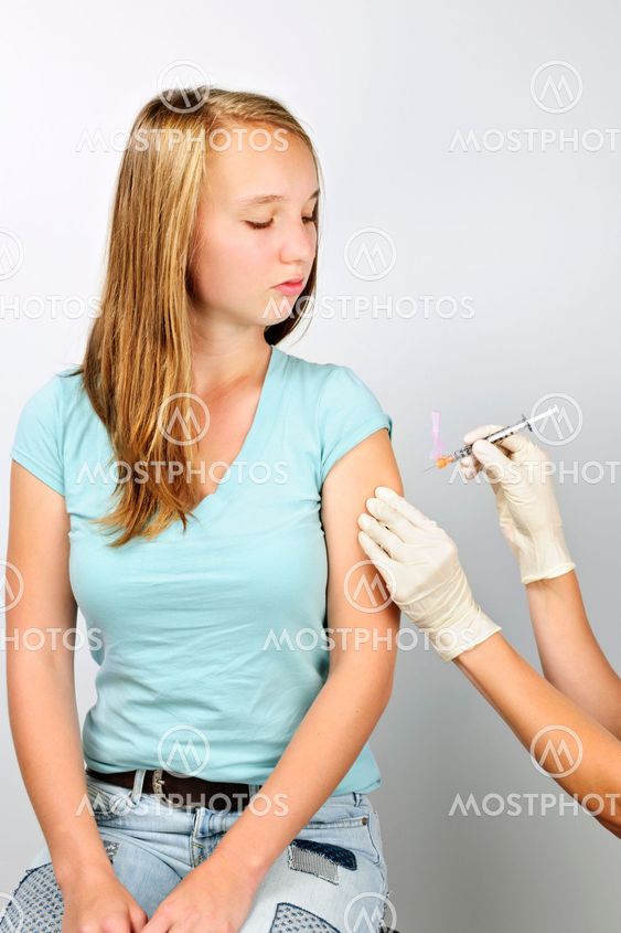 Girl getting flu shot