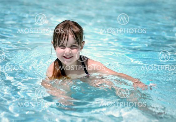 Playful Young Child in the Pool