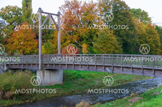 wooden suspended bridge over Mandau River