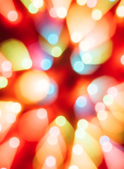 Christmas background with colourful Bokeh And Bright...