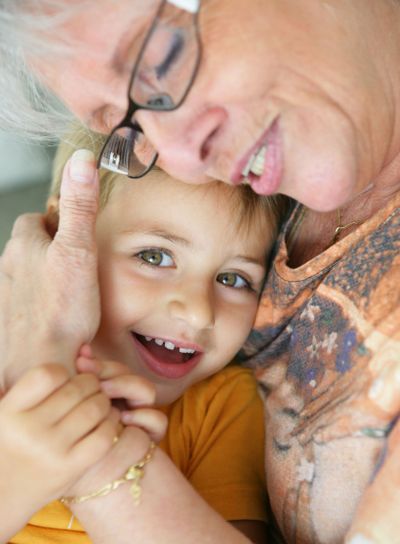 Grandma hugging granddaughter