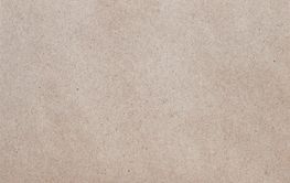 Close-up of natural paper texture in soft beige tone with...