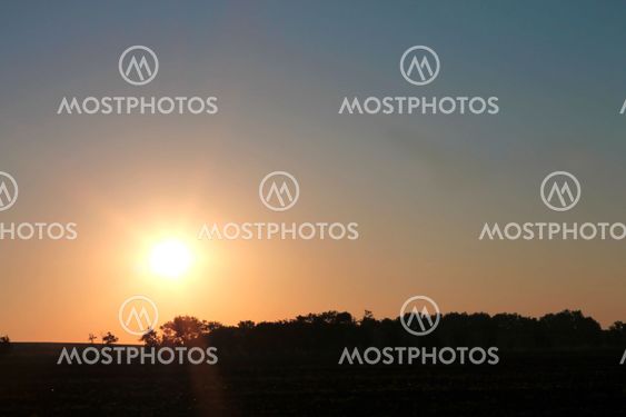 Sunrise over the summer meadow. North caucasus landscapes