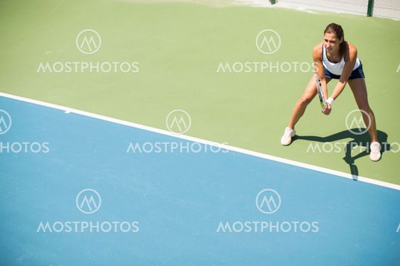 Young woman playing tennis