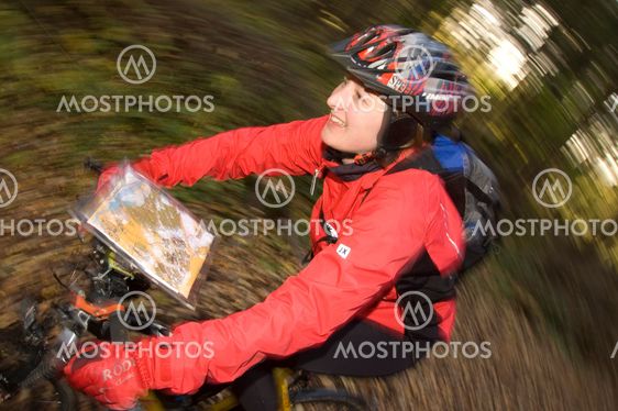 Girl racing on mountain bike