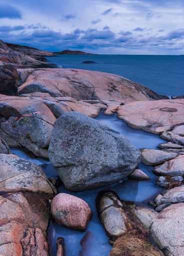 Coastal rocks and tranquil waters near Gothenburg during...