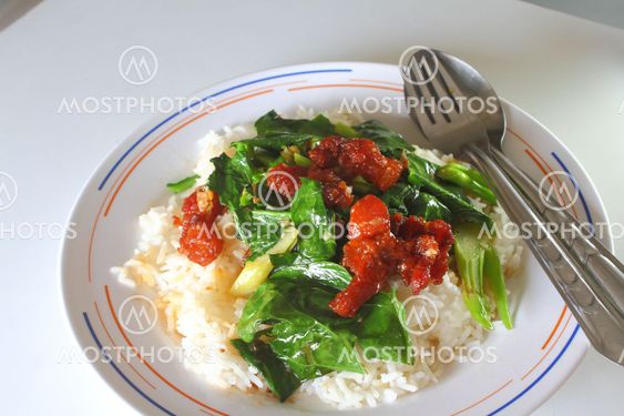 stir fried kale with crispy pork
