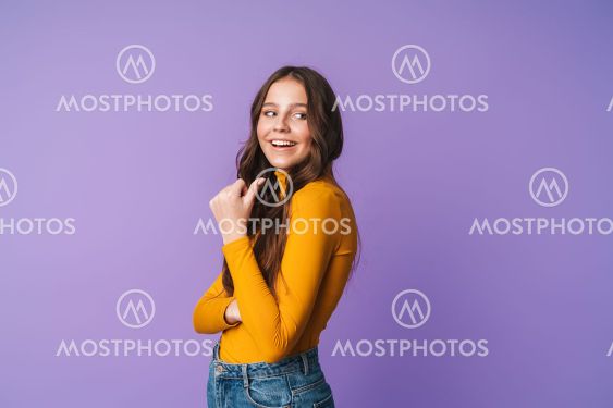 Image of young beautiful woman smiling and pointing...
