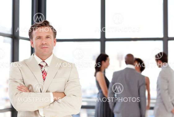Confident male manager leading his team