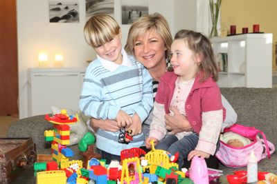 Mother playing with children