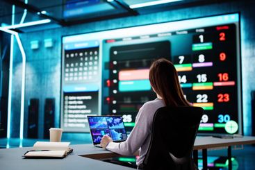 Busy Businesswoman Scheduling Meetings and Events