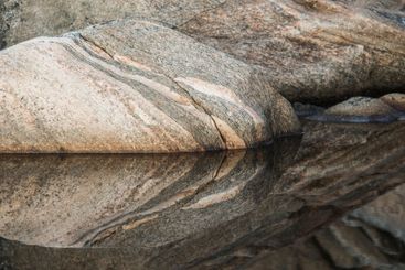 Coastal scenery in Sweden featuring textured rocks and...