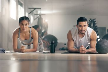 Fitness, plank and portrait of couple in gym together...