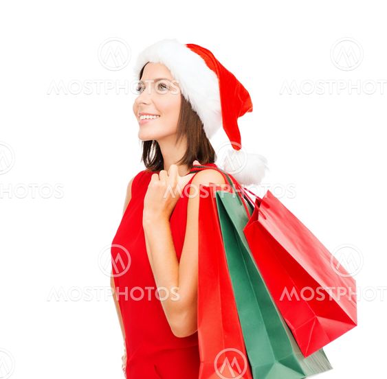 woman in red dress with shopping bags