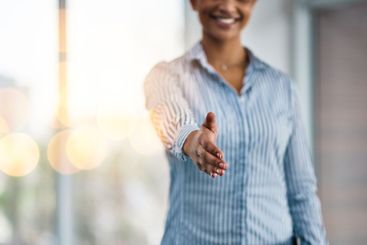 Businesswoman, offer or handshake closeup for office...