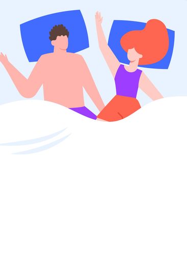 Young romantic couple sleeping together in bed with arms...