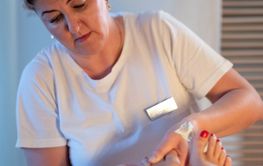 Foot Massage Therapy in a Relaxing Spa Setting. A...