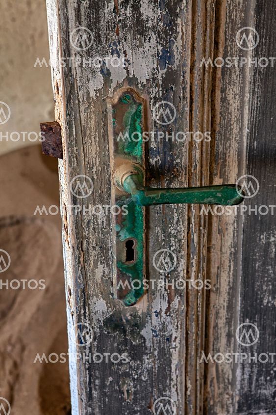 a door in kolmanskop's ghost town near luderitz namibia
