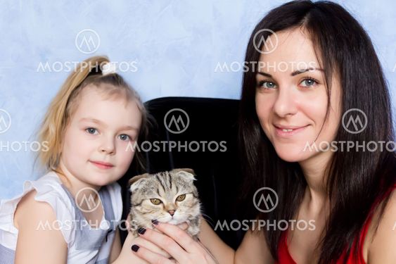 Mother, daughter and grey kitty