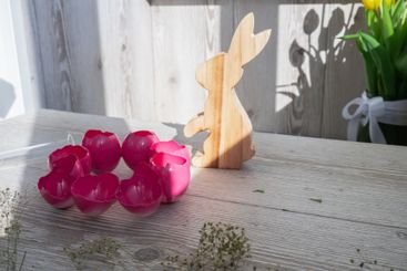 Female hands making egg shell handmade decoration for...