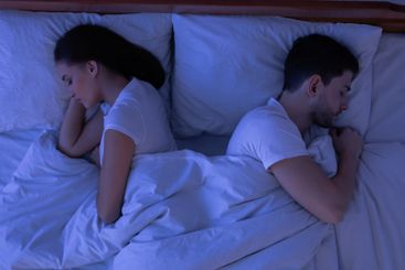 Couple Sleeping Having No Sexual Life In Bed, Top-View