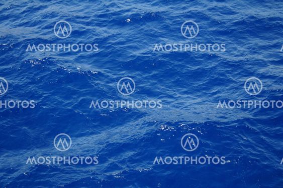 Blue sea water surface with ripple