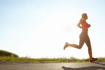 Woman, profile and running with blue sky for fitness,...