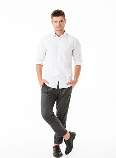 Full length portrait of a relaxed young man
