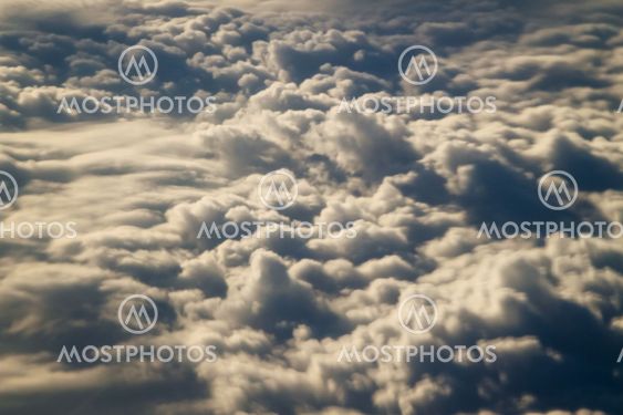 dramatic blue sky with clouds and sun rays
