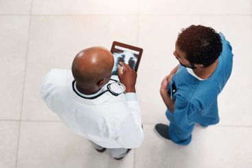 Doctor, xray and hospital with tablet, lung scan and...