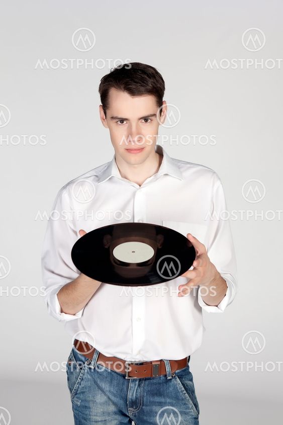 young man with a vinyl disc