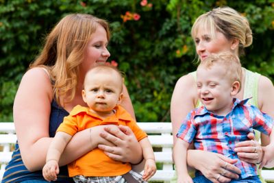 Mother and grandmother with children in a park