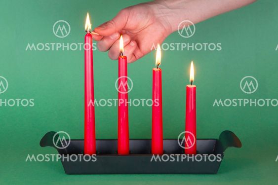 Fourth of Advent, red candles, lighted
