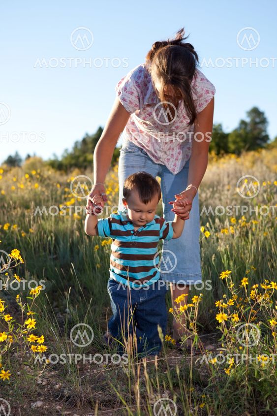 Baby boy learning to walk